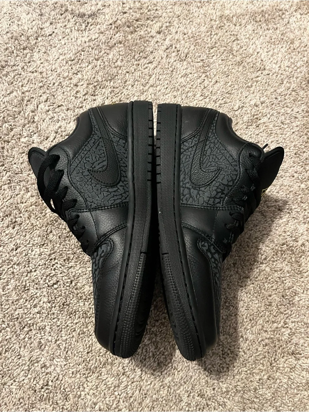 Jordan 1 Black Low-Top Sneakers with Yellow Accents